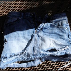 Distressed jean skirt. Fits more like a S/M.